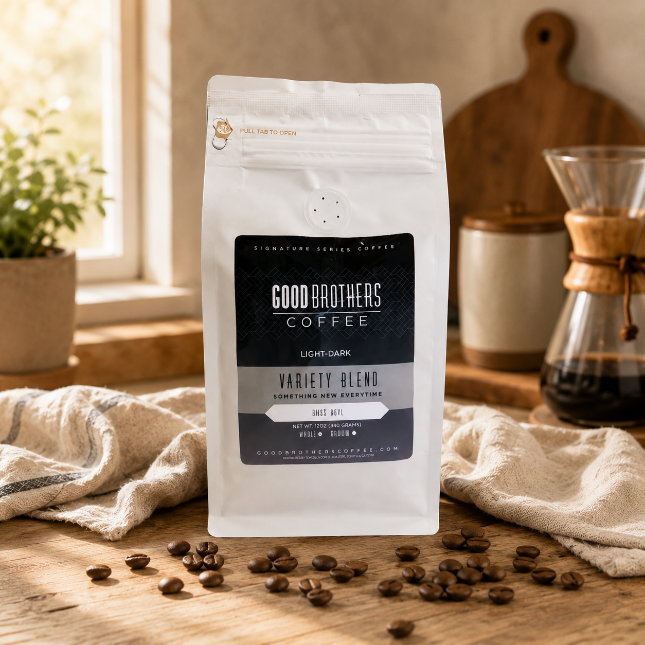 Good Brothers Coffee package on a wooden surface with coffee beans and a window in the background